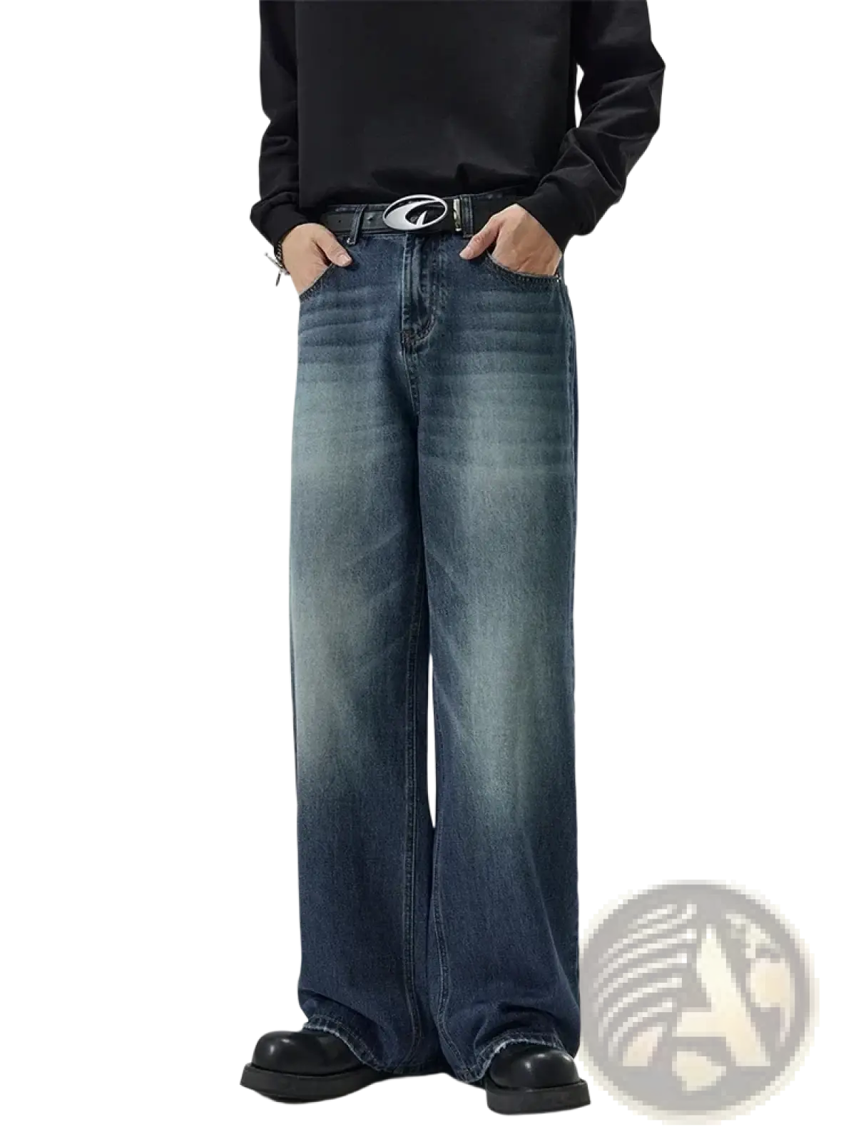 Distressed vintage baggy men denim jeans in faded blue wash with subtle whiskering and frayed hems