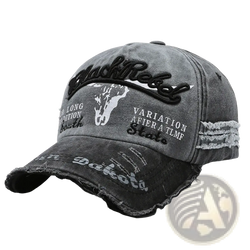 Distressed vintage embroidered baseball cap in gray denim with black and white skull graphic and frayed edges