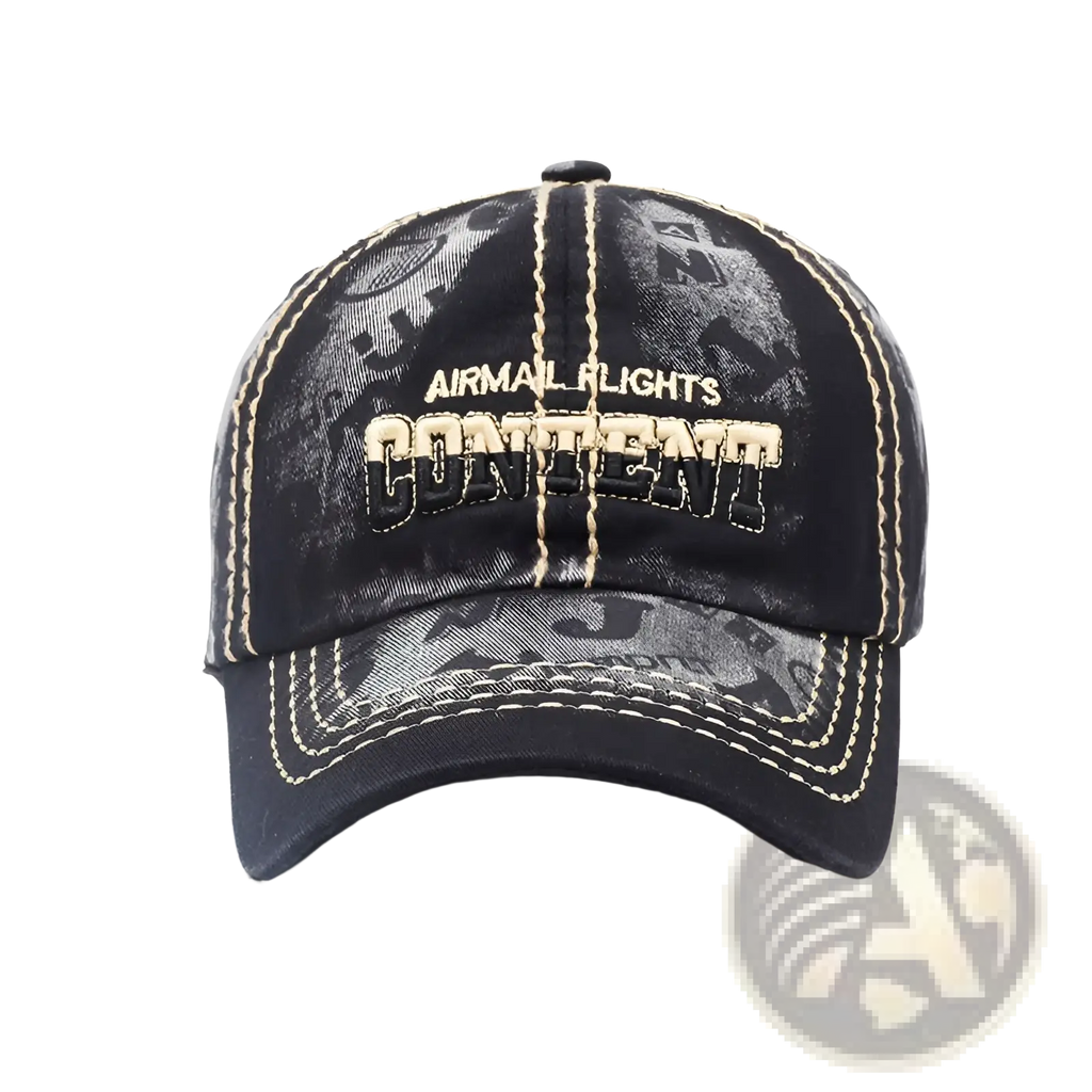 Black denim distressed washed cotton baseball cap with faded camouflage pattern and embroidered airmail flights content text
