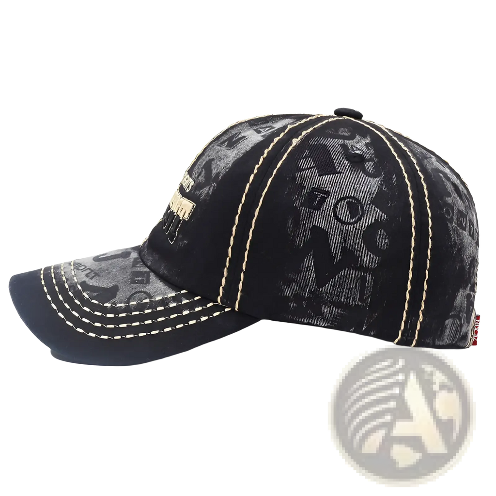 Distressed washed cotton baseball cap in black with faded gray graphic print and cream stitching along panels