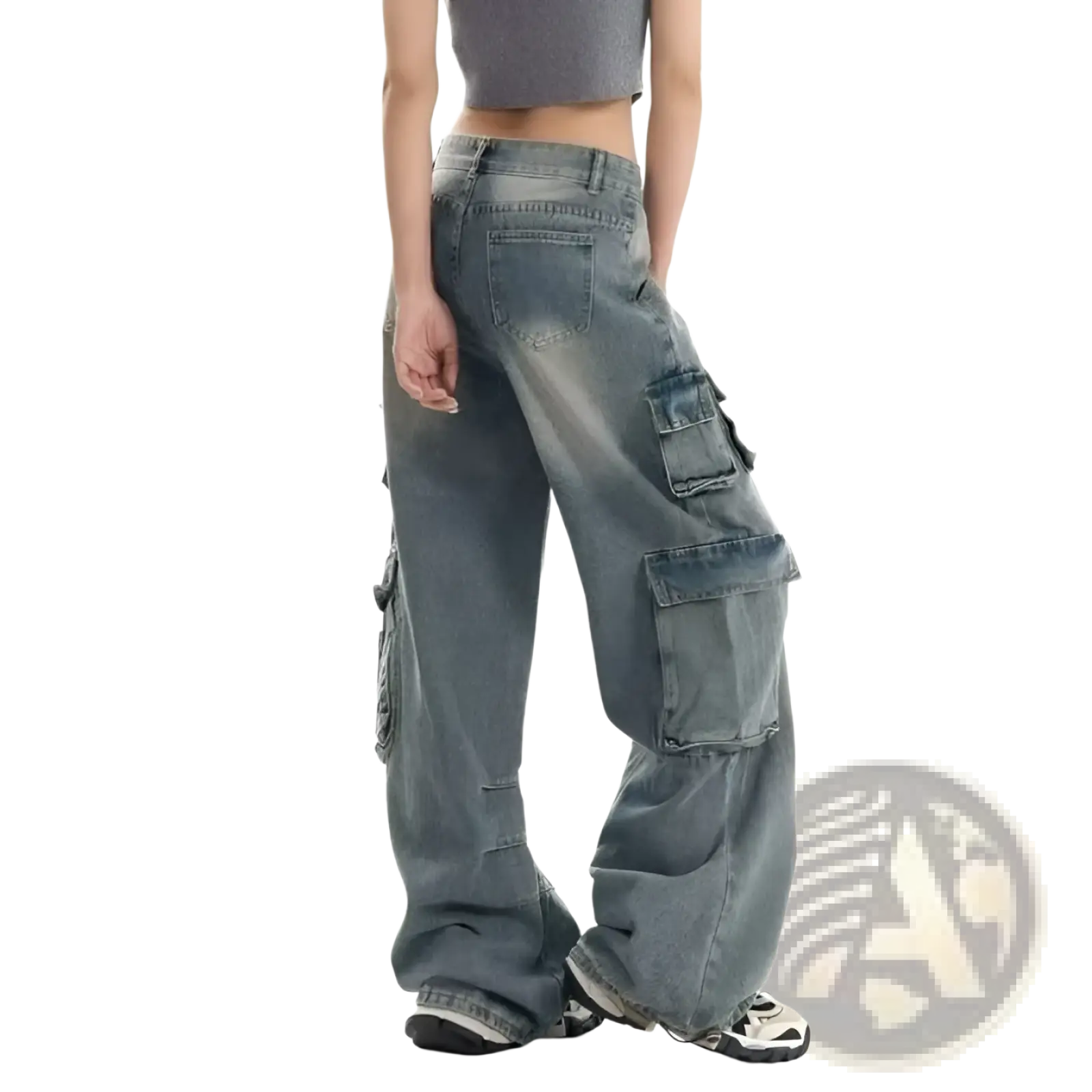 Distressed wide leg denim cargo pants in faded blue wash featuring multiple large pockets and ripped details
