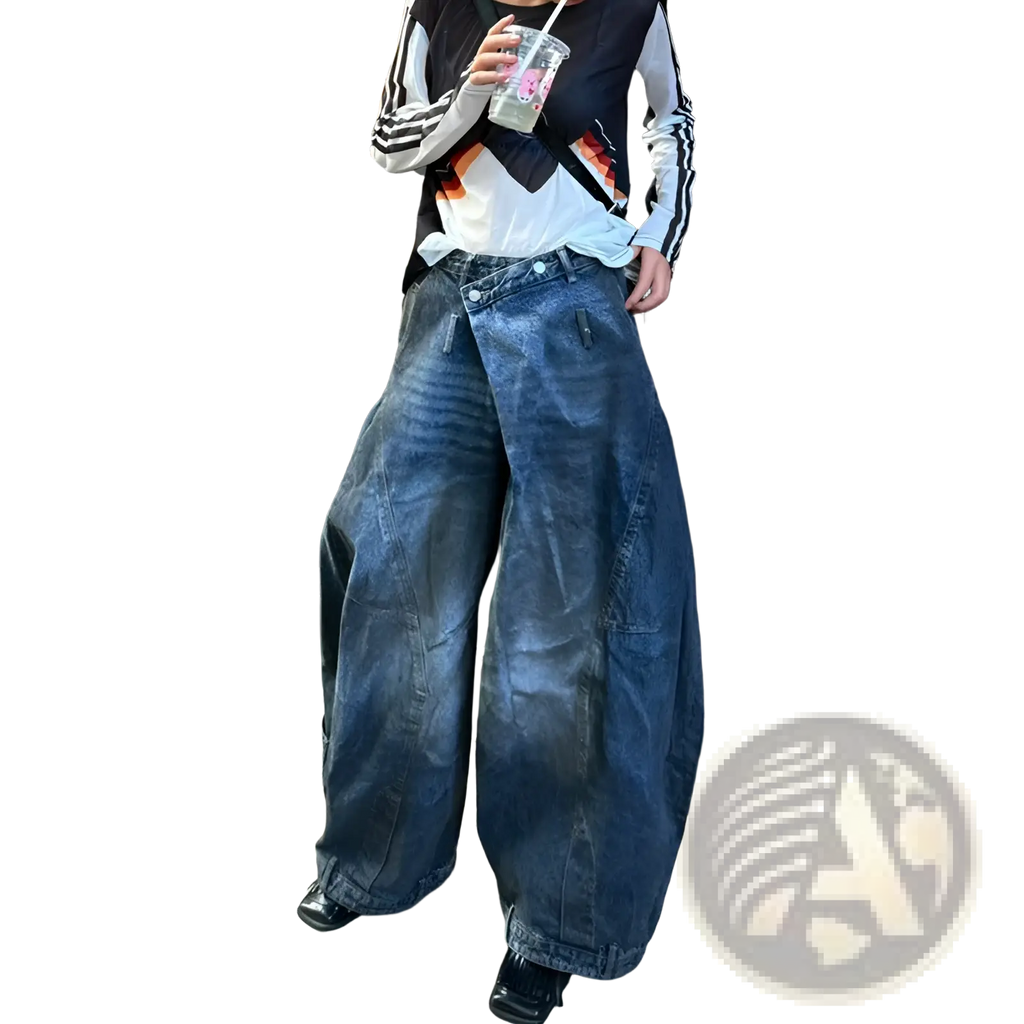 Wide-leg denim pants in faded dark blue wash with visible stitching and reinforced pockets vintage style