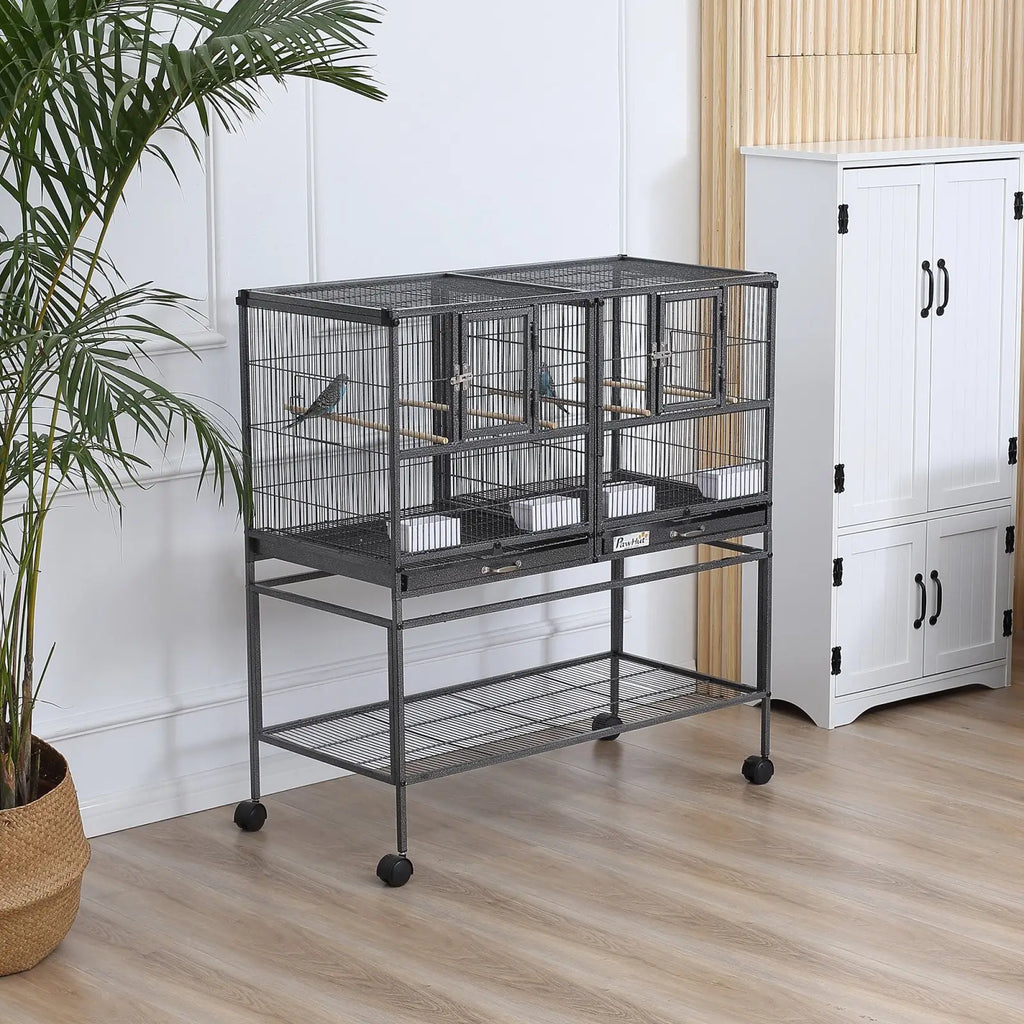 Black metal divided breeder bird cage with rolling stand trays and multiple compartments for efficient breeding organization