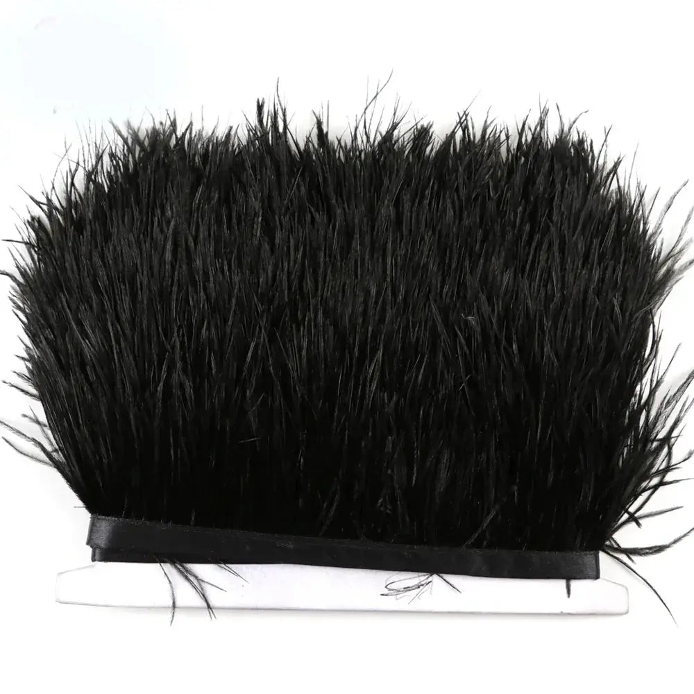 Premium feather fringe and ostrich trim featuring dense black feathers with a sleek ribbon base for diy fashion