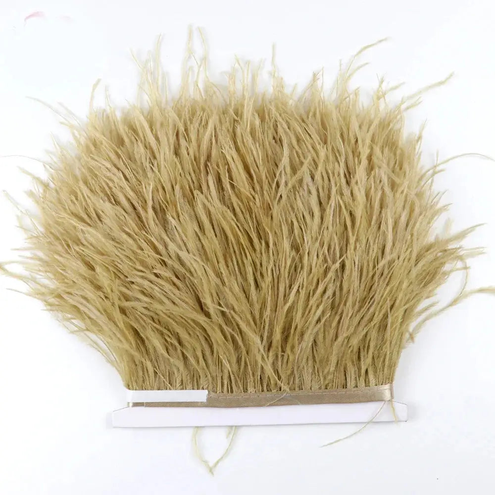 A fluffy light beige premium feather fringe and ostrich trim with soft texture and neatly bound edges for diy fashion