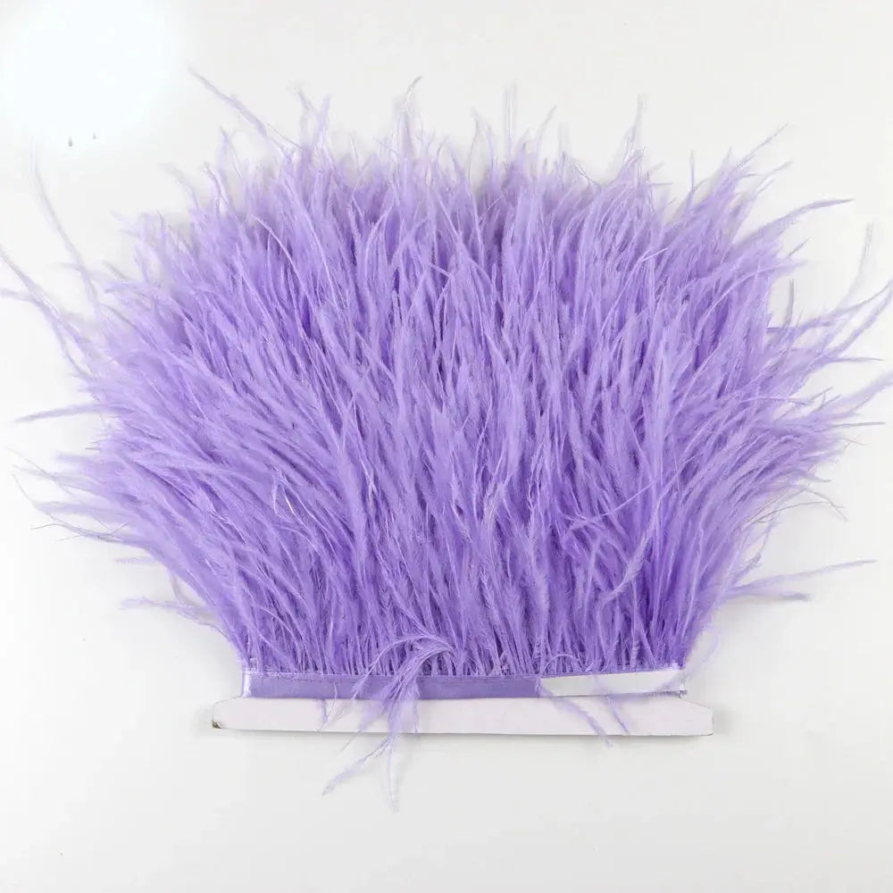 A vibrant lavender premium feather fringe and ostrich trim with soft fluffy texture and uniform length for diy fashion