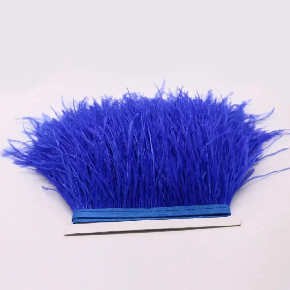 Premium feather fringe and ostrich trim in vibrant royal blue synthetic feathers with matching elastic band for easy attachment