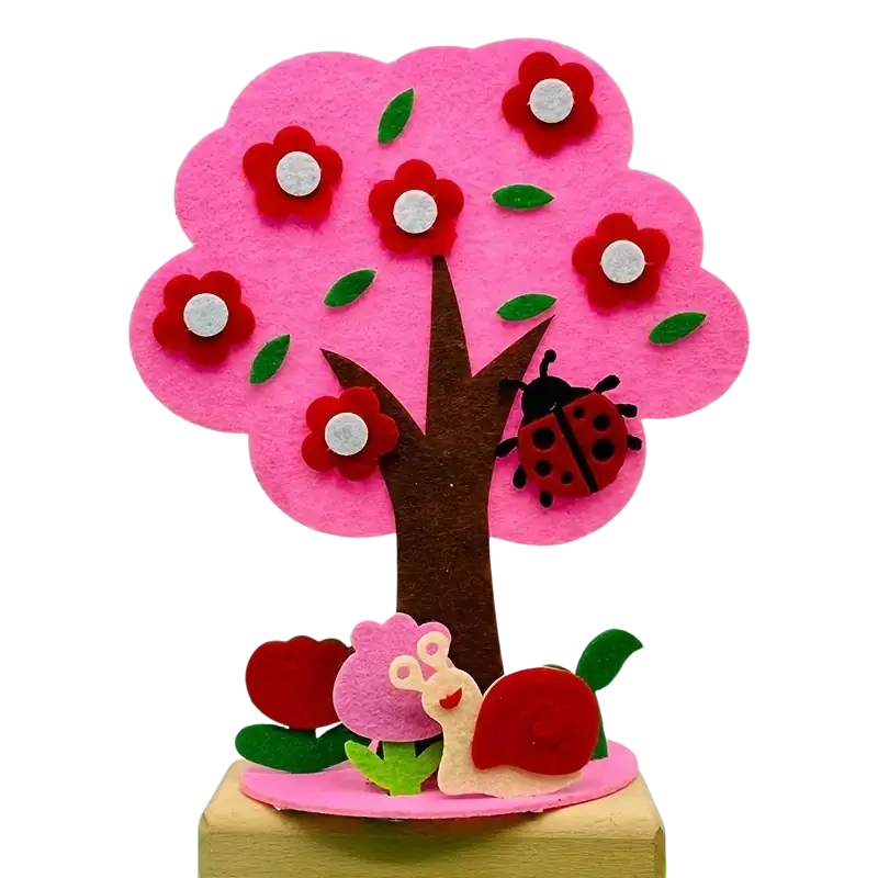Diy felt seasonal tree craft kit featuring a vibrant pink felt tree with red flowers green leaves ladybug and snail