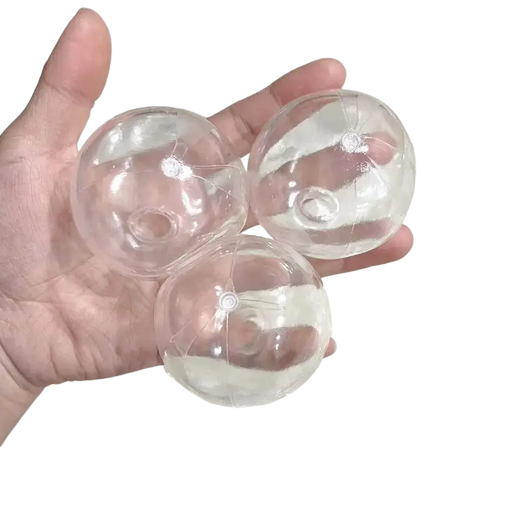 Diy handmade clear plastic beach balls held in hand for sensory squishy ball stress relief toy use