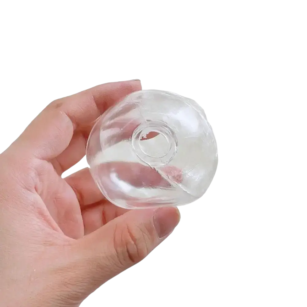 Clear transparent plastic bottle caps with central hole and rounded edges for diy handmade sensory squishy ball toy