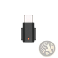 Black dji mic mini type c phone adapter with orange triangular indicator for mobile devices is shown from the back side