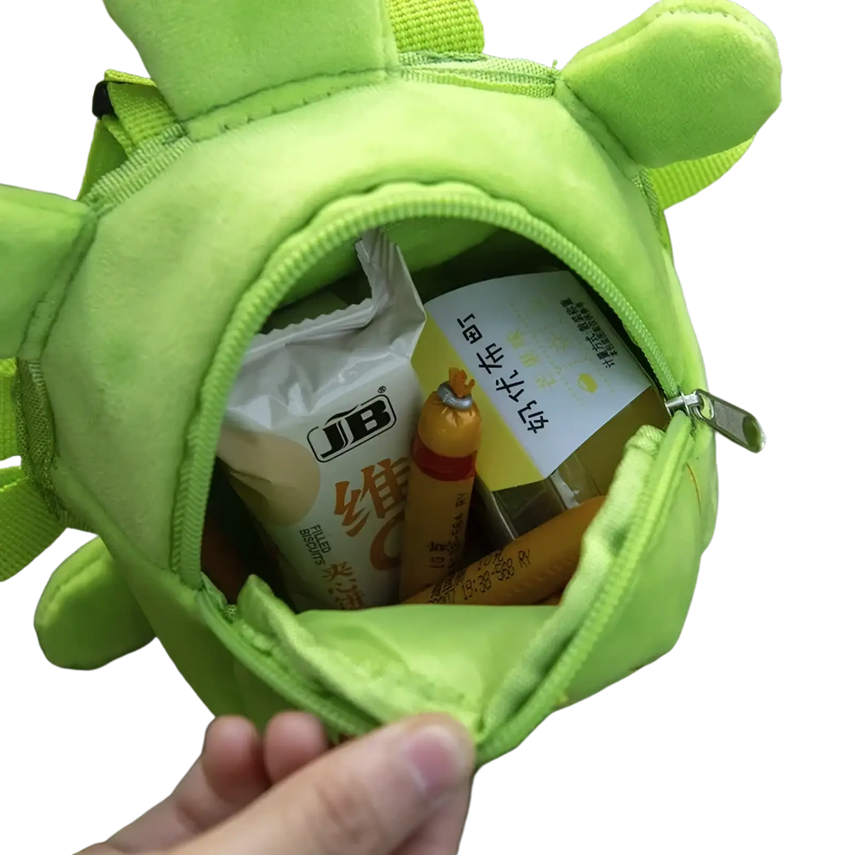 Bright green plush frog-shaped dog backpack made of soft fabric with zipper closure for pet carrying