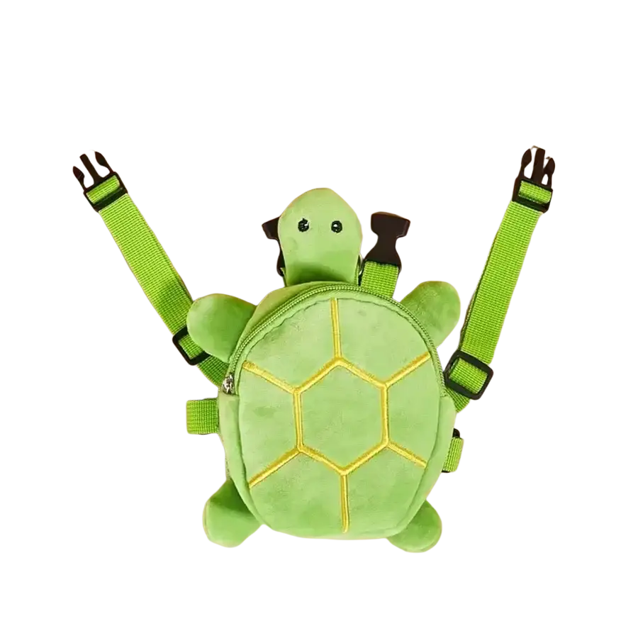 A soft lime green plush turtle-shaped dog backpack with yellow stitched shell patterns and adjustable straps