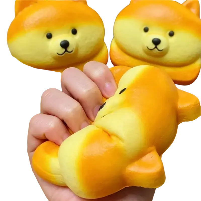 Orange and yellow gradient silicone slow rising squishy dog toy with black eyes and nose for stress relief