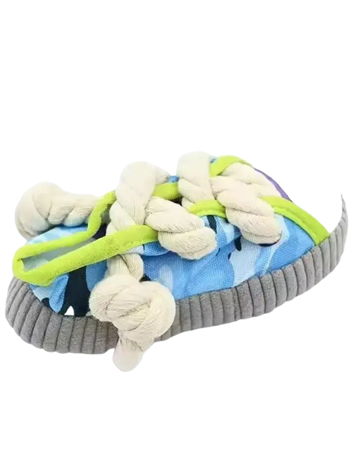 Blue camouflage slip-on shoe with thick gray corduroy sole and cream rope laces for durable chew toys use