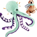 A plush mint-green and purple octopus dog toy with white spotted tentacles designed as a squeaky chew toy for puppies