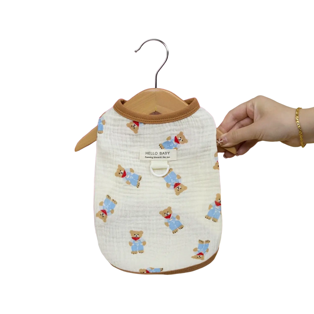 White cotton dog clothing cat vest with brown trim and teddy bear embroidery featuring hello baby label
