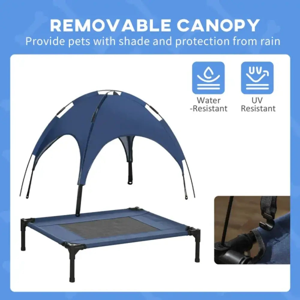 Elevated cooling pet bed with removable blue canopy, mesh base, and black legs designed for airflow and comfort