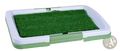 Green artificial grass dog pee pad with white plastic frame and handle indoor potty tray for dogs