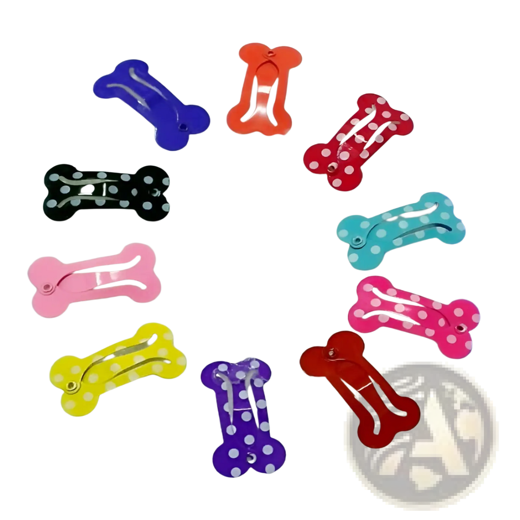 A set of colorful bone shaped dog hair clips in solid and polka dot patterns with metal barrettes