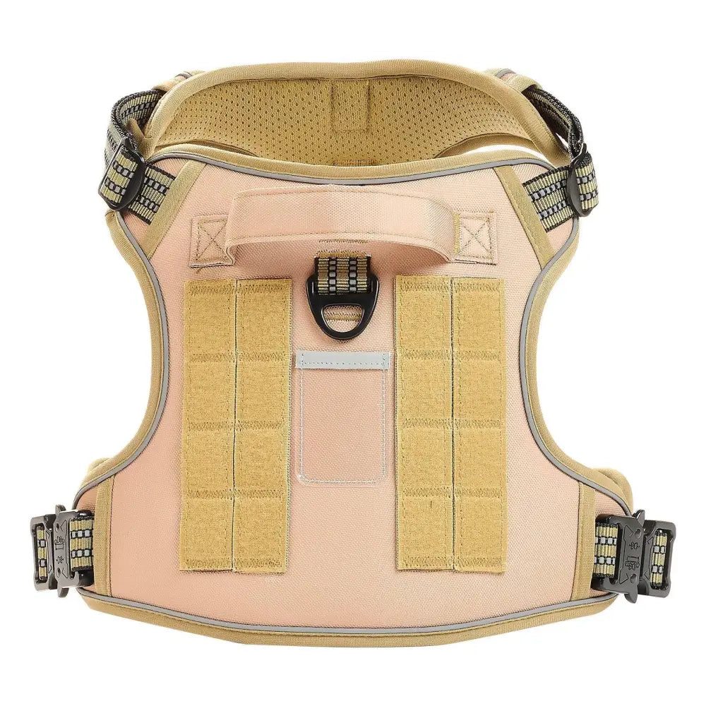 Beige tactical no pull dog harness with tan webbing straps and black plastic buckles designed for heavy duty use