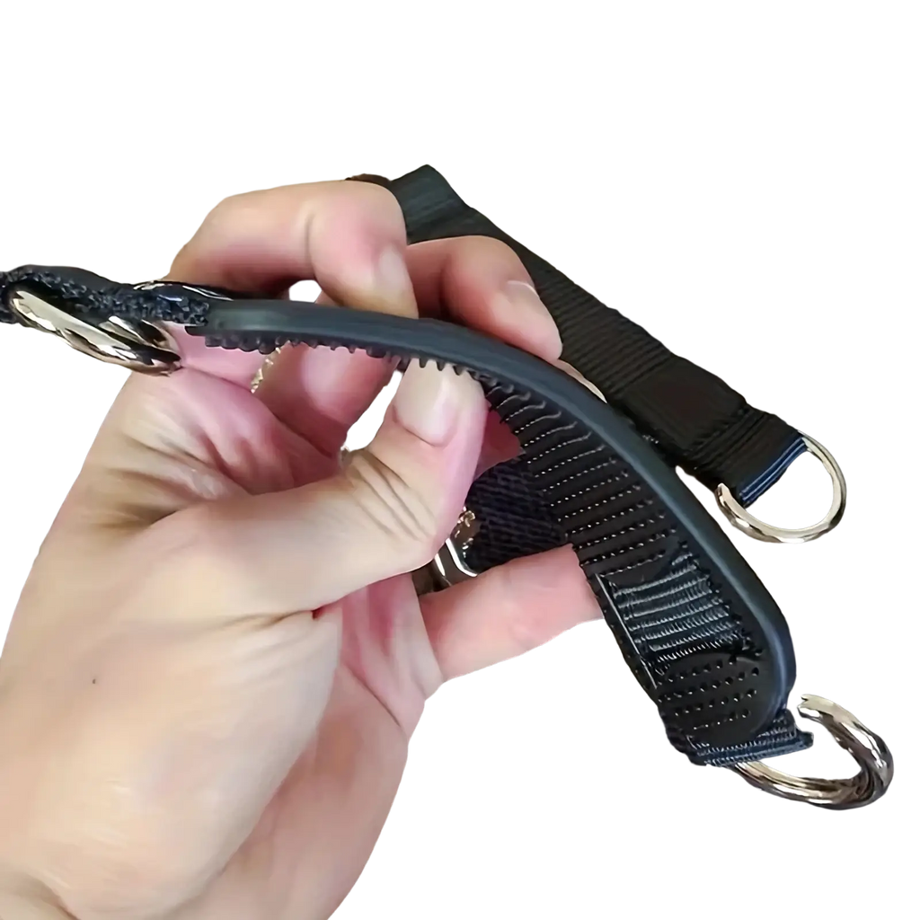 Black nylon dog leash with heavy duty rubber grip and silver metal hardware for secure suspension strap use