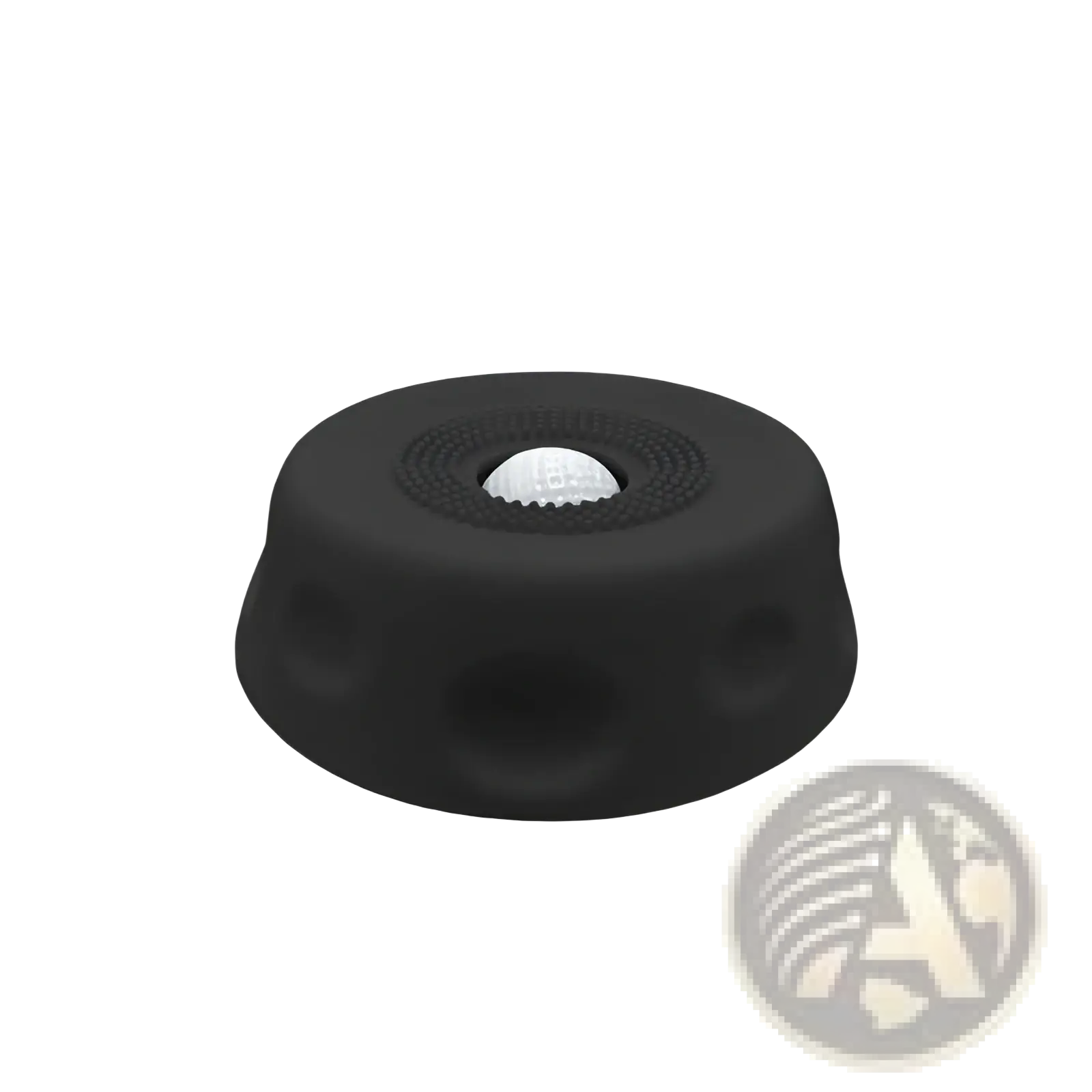 Black rubber grip cap with textured surface and central recess holding white golf ball for dog lick bowl slow feeder