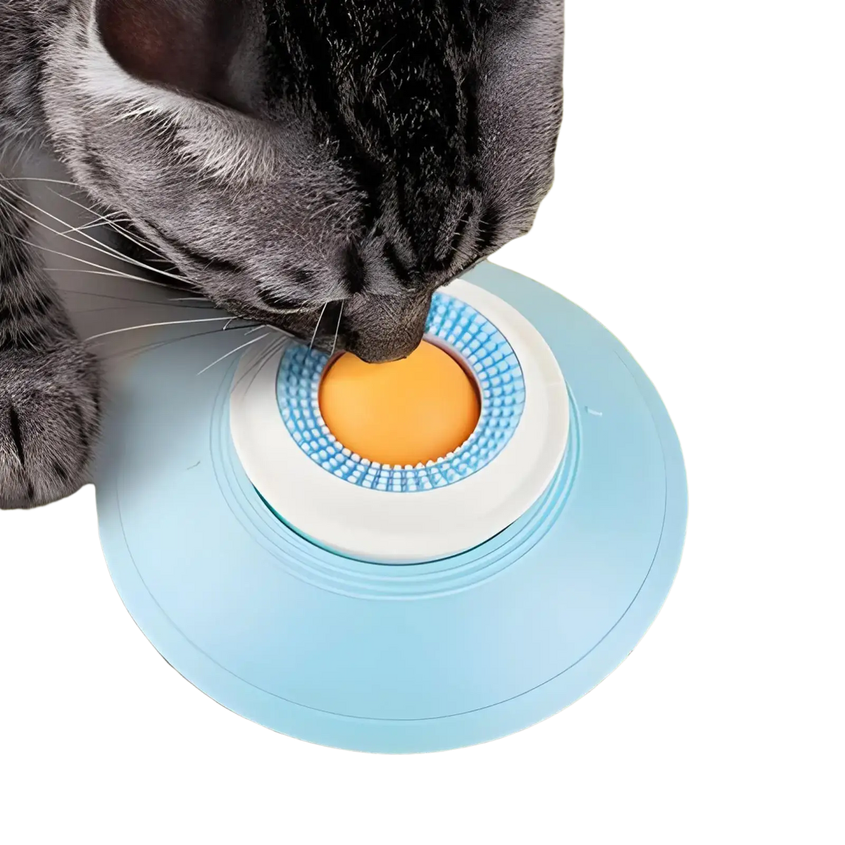Light blue plastic dog lick toy with a white center ring, orange button, and textured blue bristles for slow feeding