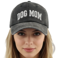 Dark gray distressed cotton baseball cap with dog mom embroidered in white arched lettering adjustable fit