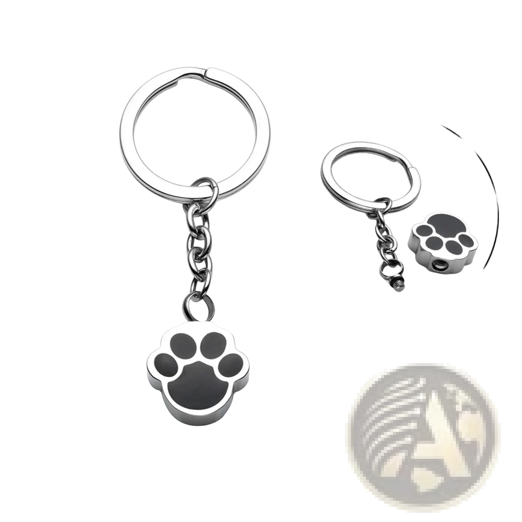 Silver dog paw urn keychain with black enamel inlay made of metal for cremation memorial pendant use