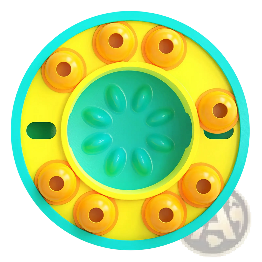Bright yellow and teal circular dog puzzle feeder slow feed interactive toy with orange suction cups around the edge