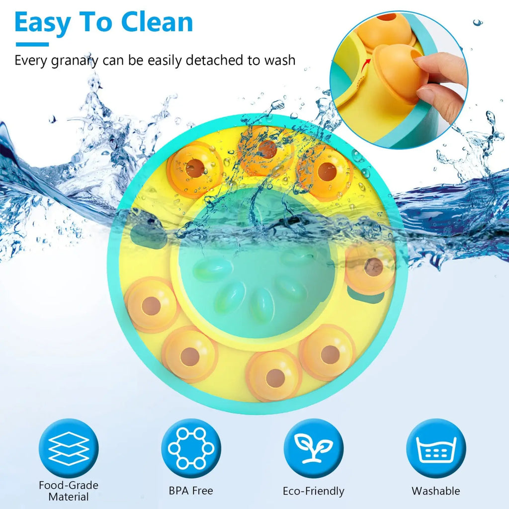 Bright yellow and teal circular dog puzzle feeder slow feed interactive toy with detachable orange granary pieces