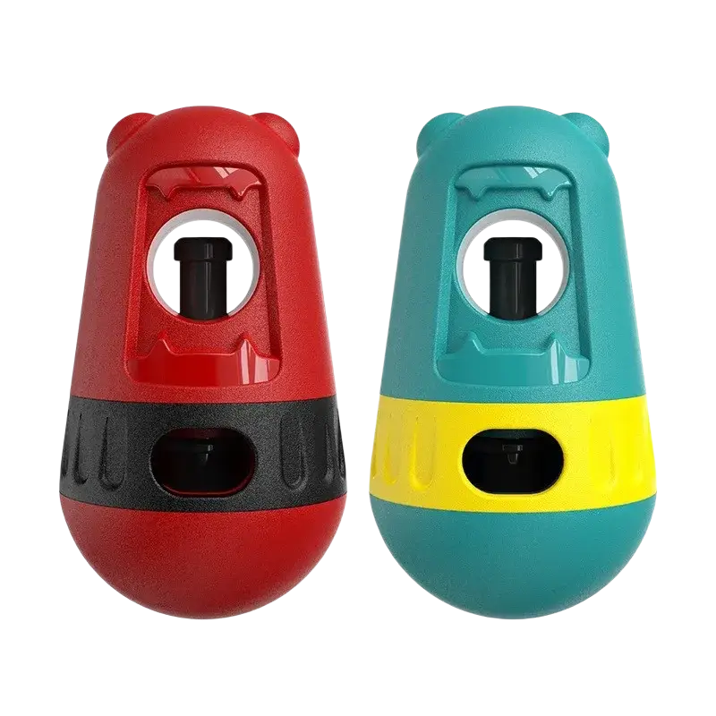 Red and teal bear-shaped dog puzzle toy and food dispenser with black accents for interactive dog food feeding