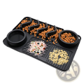 Black silicone dog slow feeder licking mat with maze design and multiple compartments to slow eating and feeding