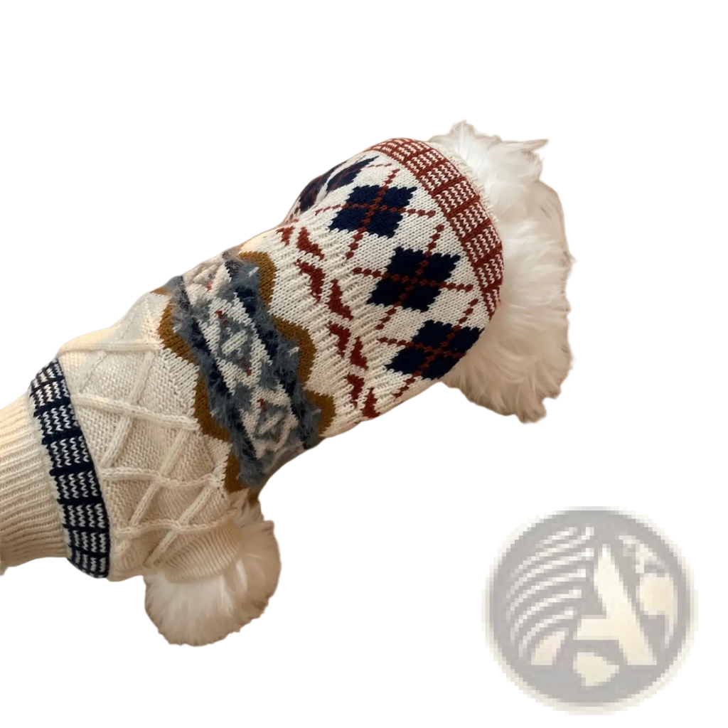 A cozy knitted dog sweater with vintage argyle pattern in cream navy blue and rust featuring decorative pom-poms
