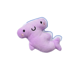 A soft lavender plush hammerhead shark dog toys pet with embroidered eyes and smiling mouth for interactive play