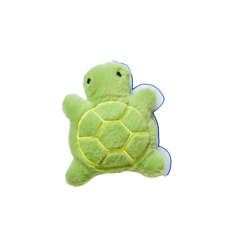 A soft light green plush turtle dog toy with yellow stitched shell details for interactive pet play