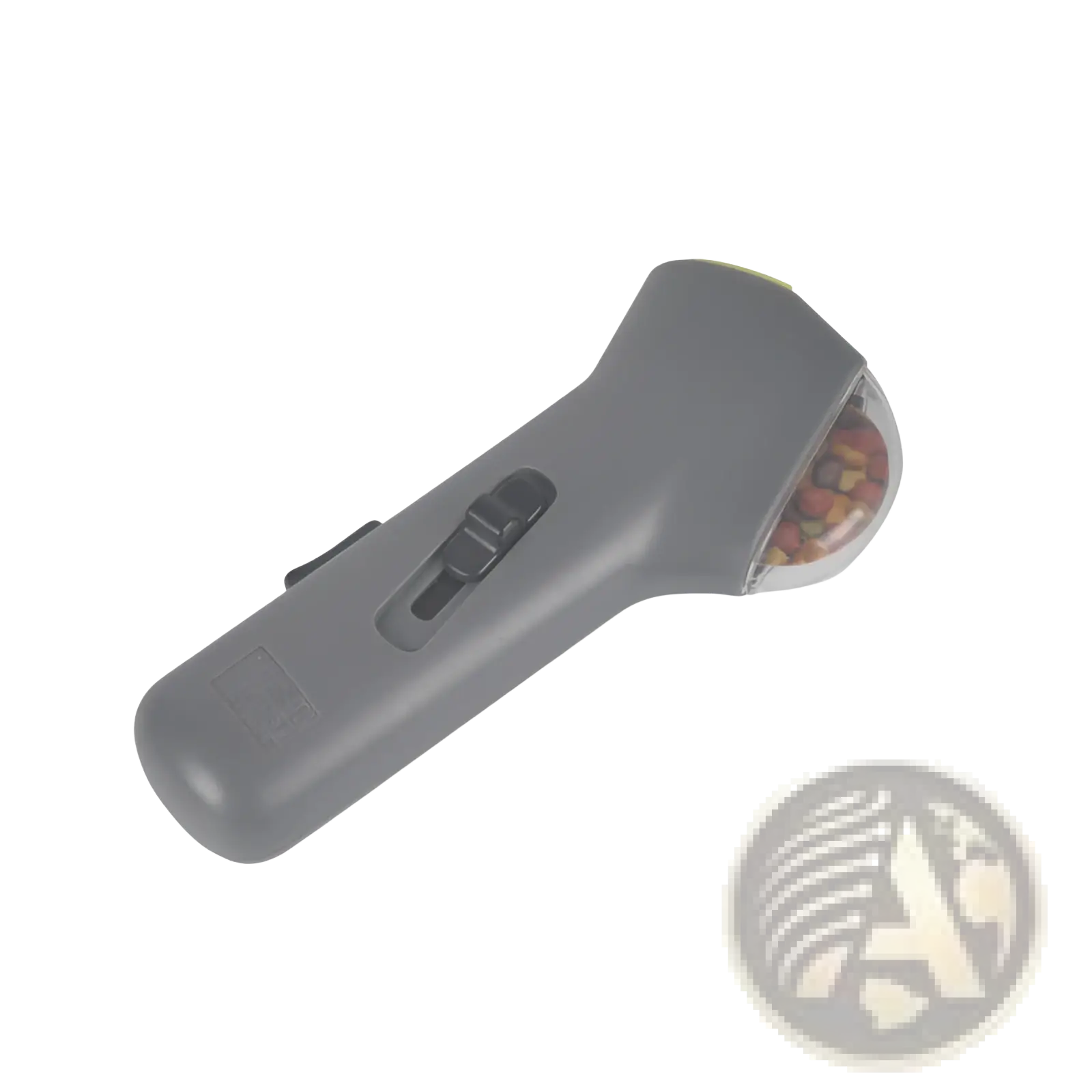 Gray plastic dog training snack launcher with clear rounded compartment filled with colorful kibble for pet treats