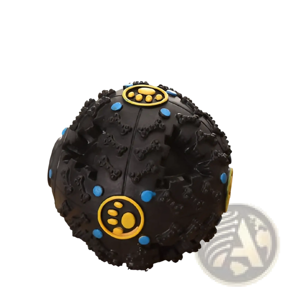 Black rubber dog treat dispenser squeaky training ball with textured surface and blue yellow paw print accents