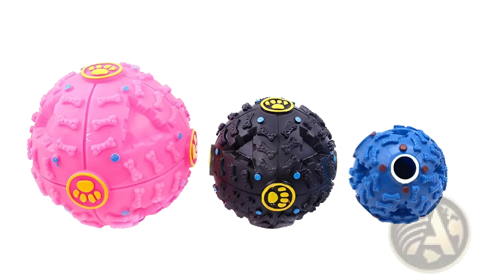 Three colorful dog treat dispenser squeaky rubber training balls in pink black and blue with paw print decals