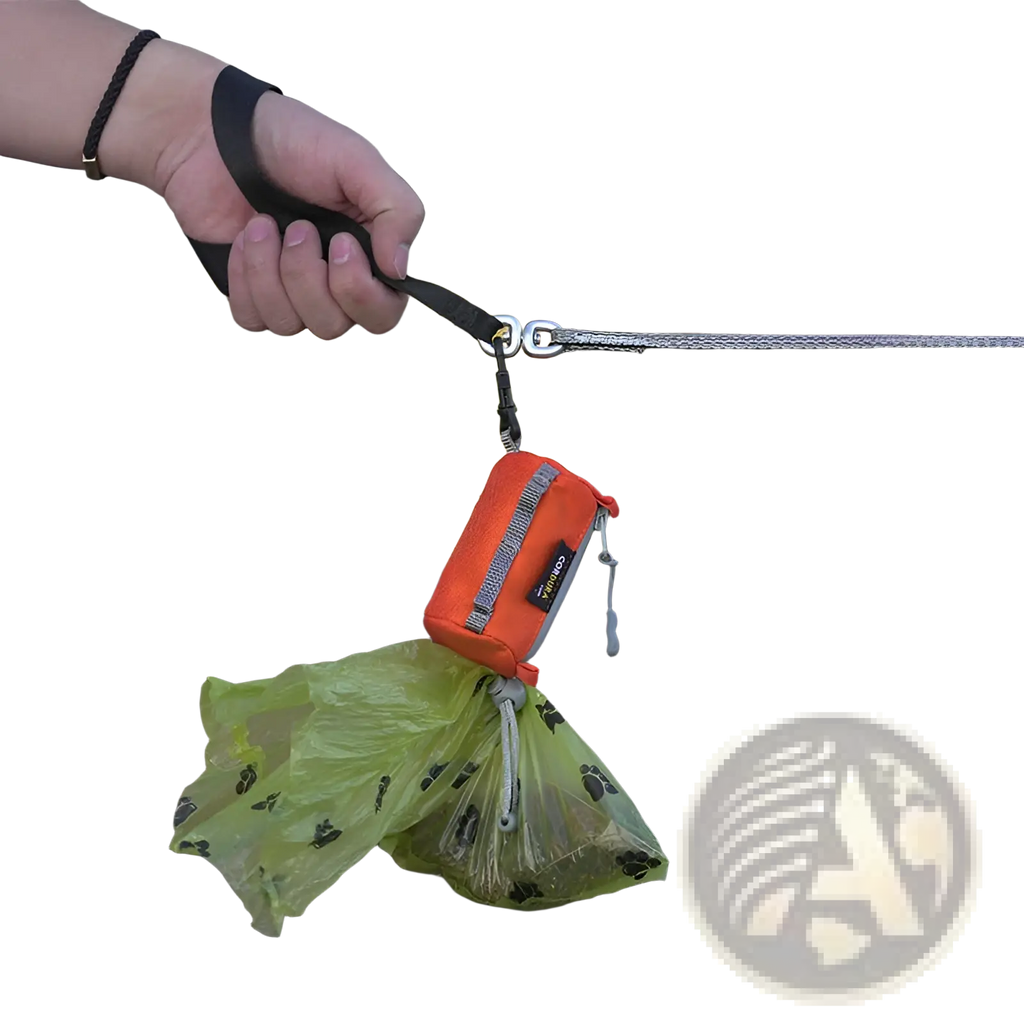 Orange durable dog waste bag holder with gray zipper and black strap attachment for compact pet poop pouch