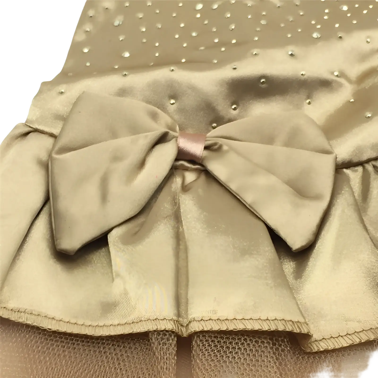 A shimmering gold satin bow with rhinestones on a dog wedding dress rhinestone tulle pet apparel