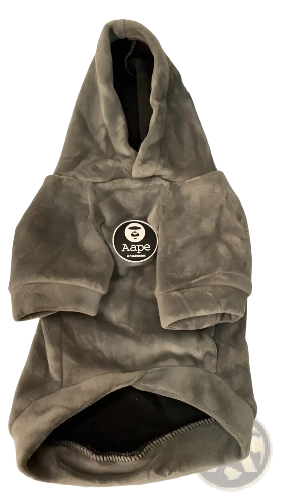 A soft olive-green velour dog winter hoodie with a fluffy gray pom-pom and Aape logo patch on the hood