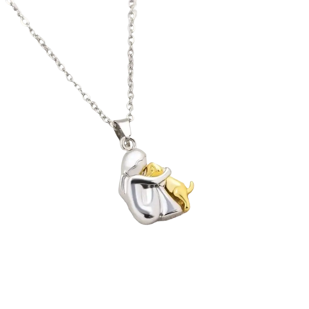 Silver and gold two-tone alloy pendant necklace featuring a detailed design of a woman hugging a dog