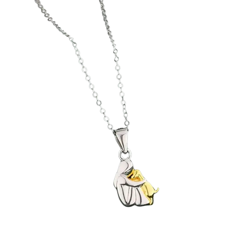 Silver and gold two-tone alloy pendant necklace featuring a delicate design of belle hugging the beast from beauty and the beast
