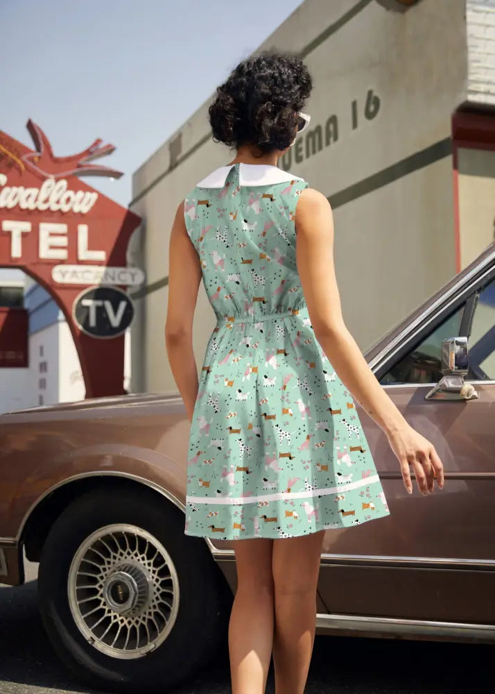 Mint green sleeveless retro a-line cotton dress with white collar and playful dachshund print with pockets