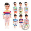 A collection of seven boy dolls with black hair and large eyes wearing a 6 piece colorful doll clothes set