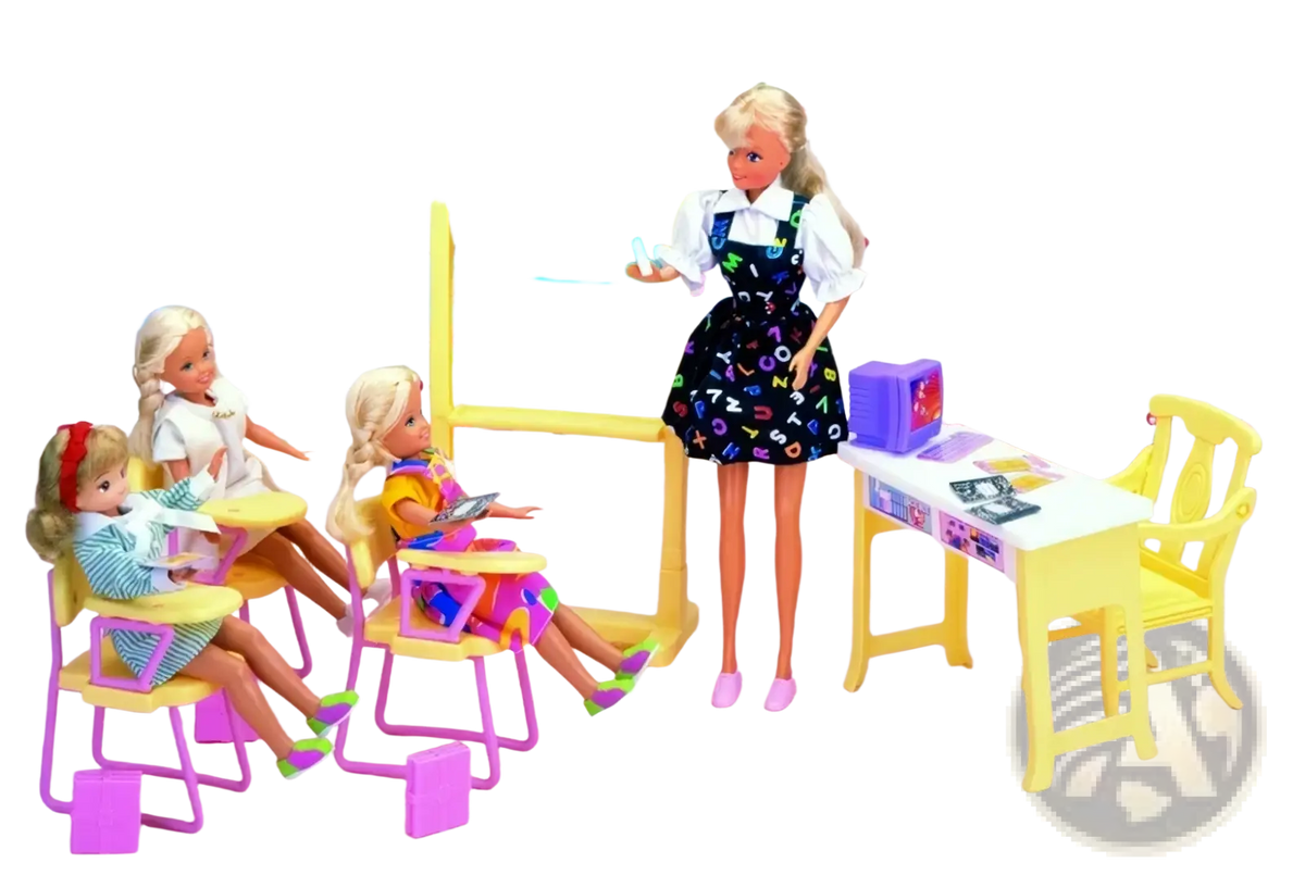 Barbie doll teacher in black dress with colorful letters and numbers stands by yellow chalkboard in doll pool playset