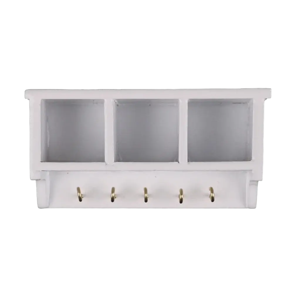 White wall-mounted dollhouse miniature organizer with three open cubbies and five gold-toned hooks below