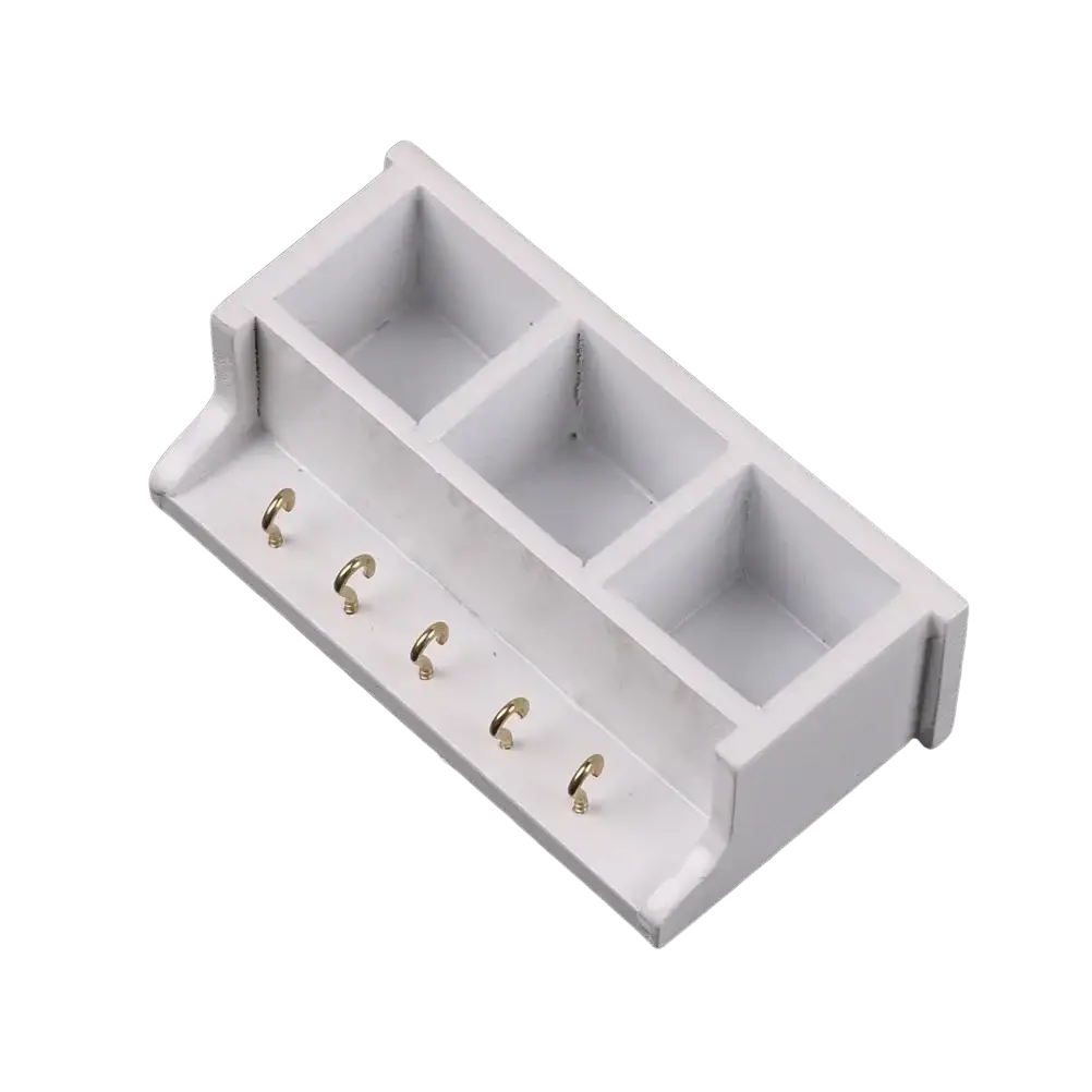 Dollhouse miniature white wall rack with three compartments and five gold-toned hooks for key storage